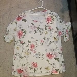 A floral shirt with a rope shoulder detail